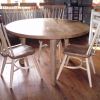 Round three leg table and chairs